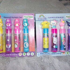 M-62 NEW SEALED SET OF 2 SEPERATE 4 PACK LIP BALMS (HELLO KITTY & CARE BEARS)